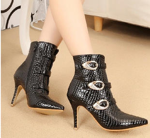 pointed snakeskin booties