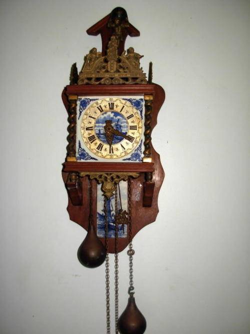 Cuckoo & Wall Clocks A Dutch WALL CLOCK with weight driven mechanism