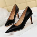 Pointed rivet stiletto heels