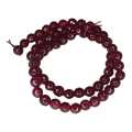 Ruby colored Jadeite bead string, round, faceted, 6mm 40cm
