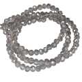 Glass bead string, faceted, rondelle, 4x5mm, smoky, 40cm