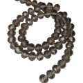 Glass bead string, faceted, rondelle, 5x7mm, smoky grey, 40cm