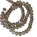 Glass bead string, faceted, rondelle, 6x8mm, smoky grey, 40cm