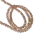 Glass bead string, faceted, rondelle, 3x5mm, champagne AB, 40cm