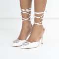 White tie up pointy heel with a round diamond trim cupid
