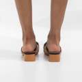 Brown line detailed flat heel slide with trim hakan