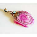 BEAUTIFUL PINK POLISHED STONE AND STERLING SILVER PENDANT