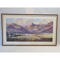 A framed original signed P van Blommestein oil on board painting of a mountain scene