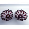 Two Burgundy / Red cut crystal ashtrays