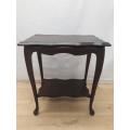 A stylish Queen Anne footed Imbuia two tier occasional table