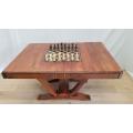 An incredible large chess and games table with ceramic chess pieces and a drawer to store games