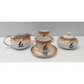 A wonderful Rooibos ceramic tea set made by Constantia including two cups and saucers, a milk jug...
