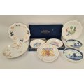 A superb collection of eight porcelain pin plates including Royal Albert, Limoges, Royal Worceste...