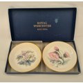 A superb collection of eight porcelain pin plates including Royal Albert, Limoges, Royal Worceste...