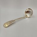 An incredible antique (1854) Victorian hallmarked British sterling silver sauce ladle