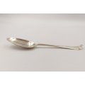 A gorgeous and substantial antique (1764) English hallmarked sterling silver serving spoon
