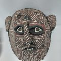 A traditional North Zimbabwean/ Zambian canvas hand painted tribal ceremonial mask