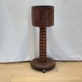 An incredible antique Partridge wood barrel-top planter stand with a turned centre column and stu...