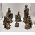 A beautiful large 7 piece gold Nativity set including the 3 wise men, Mary and Joseph and baby Jesus