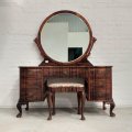 A stunning original "Jonkers of Knysna" solid Stinkwood 7-drawer ball and claw dressing table wit...
