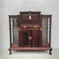 A stunning original Merlin Furniture solid Stinkwood drinks cabinet with two glass glasses cabine...