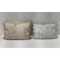 Two beautiful rectangular scatter cushions - a silky gold brocade fabric and a white fabric with ...