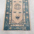 A beautiful blues and cream short-fringe pure wool vintage woven rug with oriental floral patterns