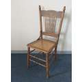 A stunning antique Edwardian pressed-wood Oak spindle-back chair