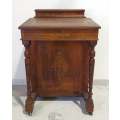 An incredible antique walnut-burr ship captains Davenport desk with inlay detailing