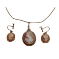 An antique 9ct gold mounted shell Cameo pendant and earring set