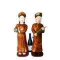 A pair of Indonesian painted wooden statues. Amazing display pieces in all rooms