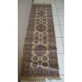 A stylish Chiraz Belgium made machined flat weave Persian runner carpet (230cm x 68cm).