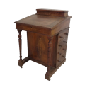 An incredible antique walnut-burr ship captains Davenport desk with inlay detailing