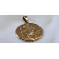 A large 9ct Gold St Christopher pendant