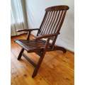 A stunning slatted wood deck/ occasional chair.