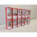 A set of twelve collectible 1992 340ml Coke Calender cans