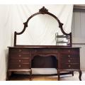 A stunning carved Queen Anne 9-drawer dressing table with a centre cartouche and scrolled mirror ...
