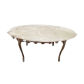 A beautifully crafted oval Italian marble top and ornate solid brass centre coffee table