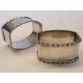 A pair of antique stamped sterling silver serviette rings. Weight 51.41g