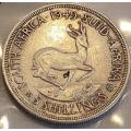 A collectible South African King George VI 5 1949 shilling coin in good condition.