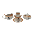 A wonderful Rooibos ceramic tea set made by Constantia including two cups and saucers, a milk jug...