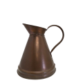 A large vintage Copper water pitcher