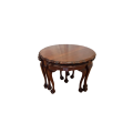 An exquisite vintage solid Stinkwood scalloped edge ball and claw 5-table nesting table set
