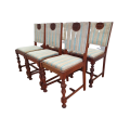 A set of six vintage carved Teak upholstered dining chairs
