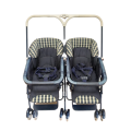 A very well made Italian Peg-Perego "Caravel" blue and white twin pram/ stroller with brakes and ...