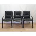 Three faux leather with black metal frames occasional chairs