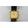 An original vintage ladies gold plated "Longines Vogue" watch with leather strap