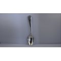 An antique hallmarked sterling silver spoon (15.87 grams)