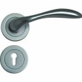Curved lever handle on rose