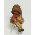 Small Wooden Brown Doll on Chair